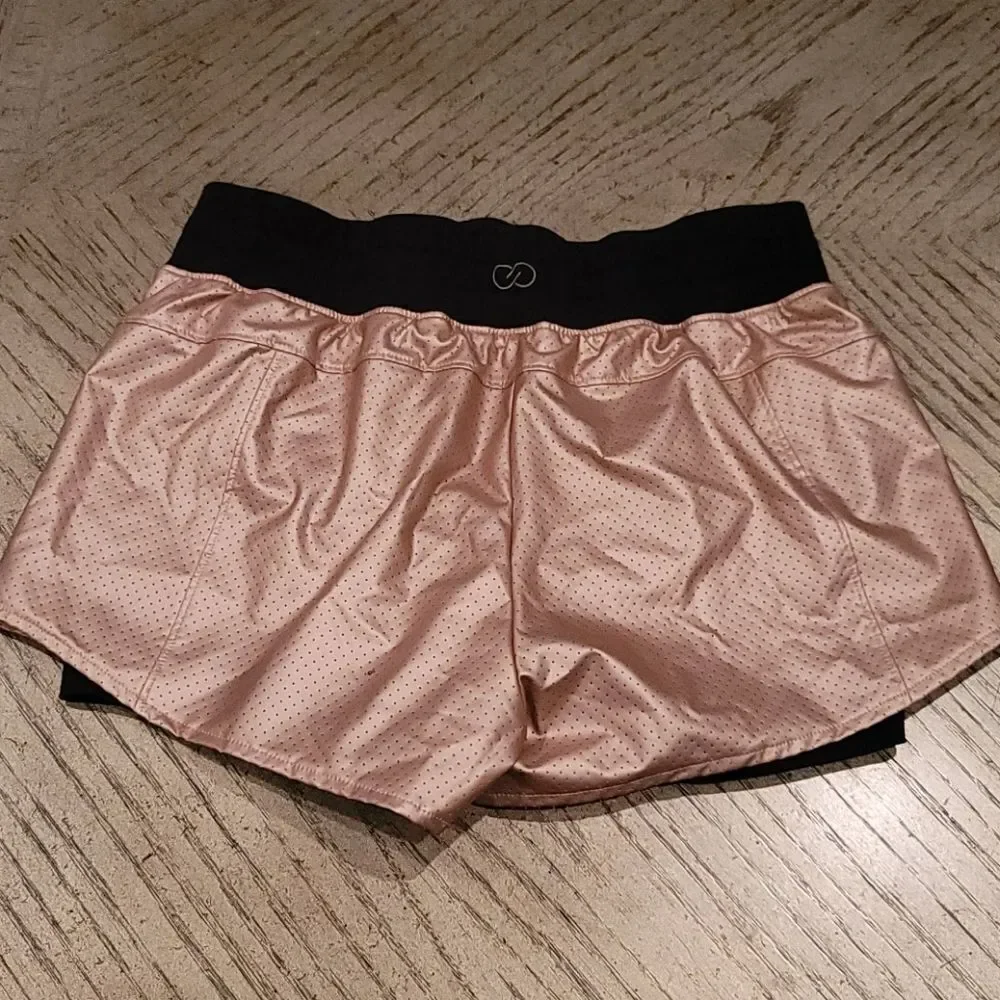 Cala by Carie Underwood 2 in 1 Rose gold shorts XS